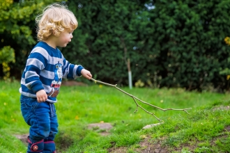 Wildlings - child with stick