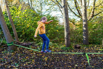 girl on slackline SWT Family Fun Day 2023