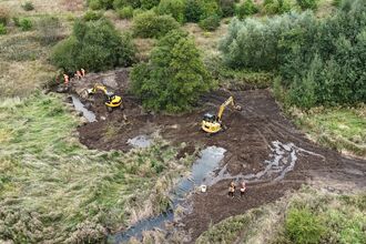 Diggers infill a part of the river