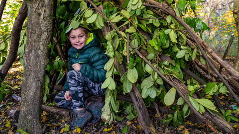 Boy in den by Adrian Clarke