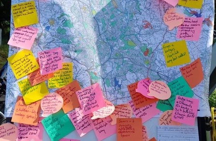 a range of colourful sticky notes on a map
