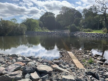 A river at the point of a removed weir.