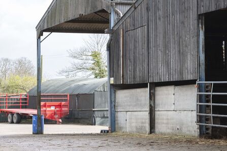 A resurfaced farmyard with smooth pavement.