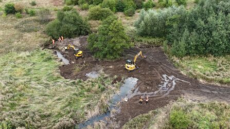 Diggers infill a part of the river