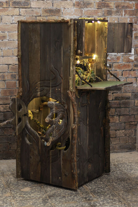 A peek inside a cabinet fashioned to look like drift wood
